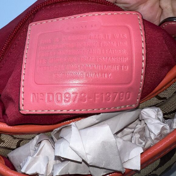 Coach Legacy Signature Canvas Crossbody Bag with a turn-lock closure. - Picture 3 of 11